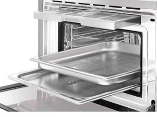 Компактный духовой шкаф с пароваркой Smeg SF4750VCBS фото 4 в Новосибирске