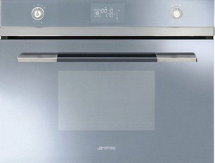 Компактный духовой шкаф с пароваркой Smeg SF4120VCS фото в Новосибирске