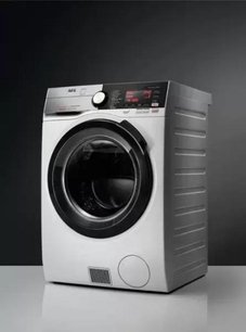 Стирально-сушильная машина AEG L9WBCN61B фото 2 в Новосибирске