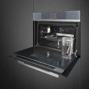 Компактный духовой шкаф с пароваркой Smeg SF4104WVCPS фото 2 в Новосибирске