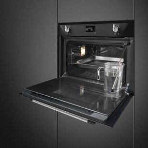 Компактный духовой шкаф с пароваркой Smeg SF4920VCN1 фото 2 в Новосибирске