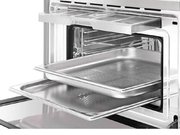 Компактный духовой шкаф с пароваркой Smeg SF4750VCBS фото 4 в Новосибирске