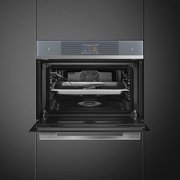 Компактный духовой шкаф с пароваркой Smeg SF4104WVCPS фото 4 в Новосибирске