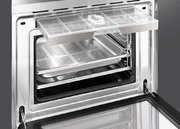 Компактный духовой шкаф с пароваркой Smeg SF4920VCX фото 3 в Новосибирске