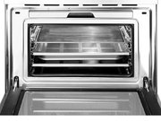 Компактный духовой шкаф с пароваркой Smeg SF4750VCBS фото 3 в Новосибирске