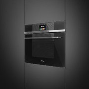 Компактный духовой шкаф с пароваркой Smeg SF4104VCN фото 2 в Новосибирске
